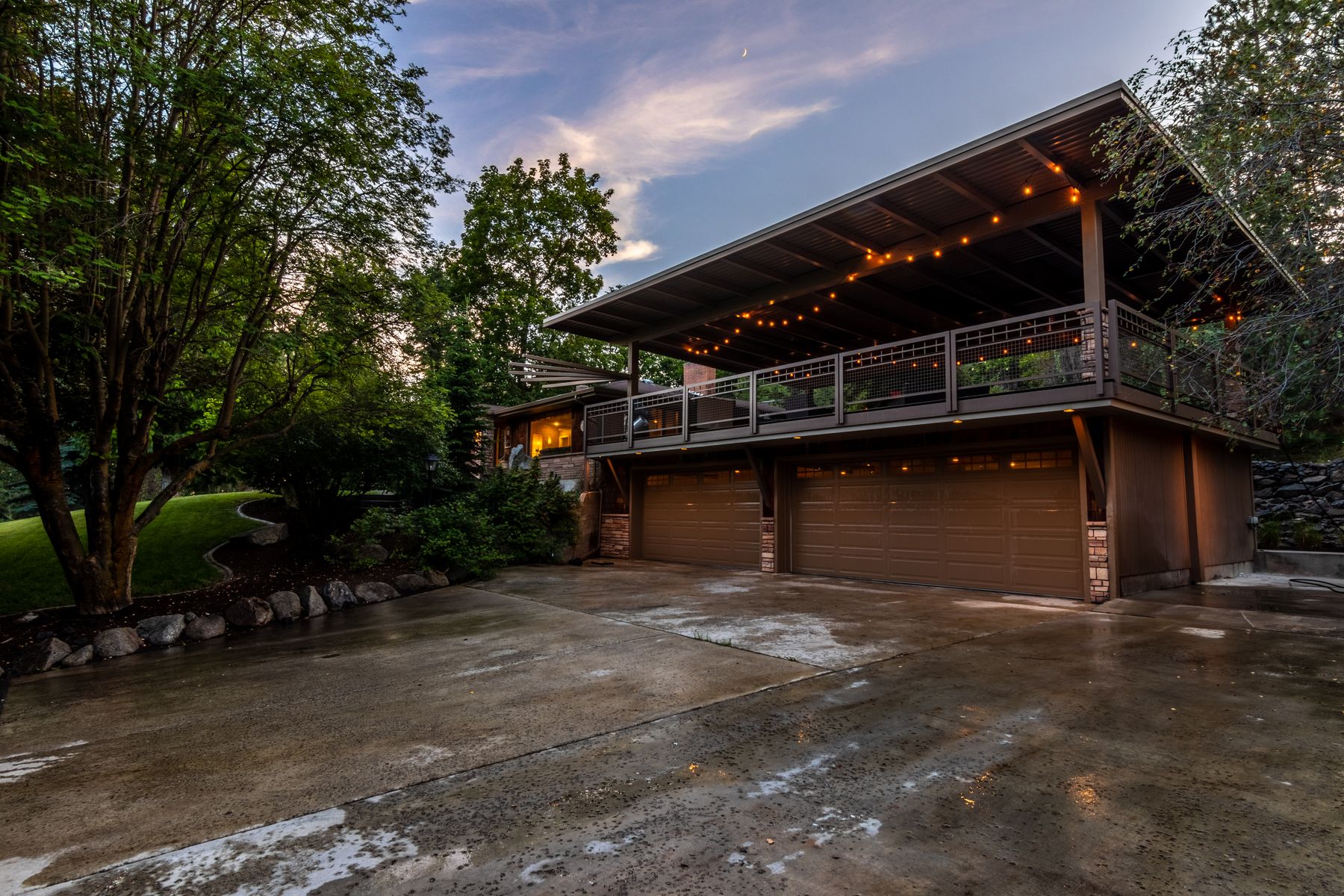 Generic luxury home exterior at dusk